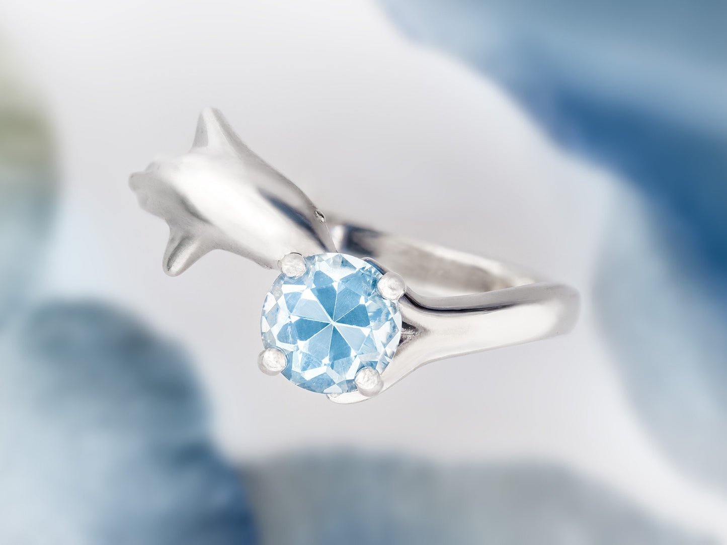 Blue topaz Dolphin ring. Natural, 6mm sky blue Topaz gemstone set in handmade premium silver ring.