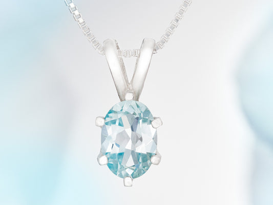 Light Blue Aquamarine Pendant and Chain from Brazil.  Wonderfully cut, 7x5mm Oval Gemstone.