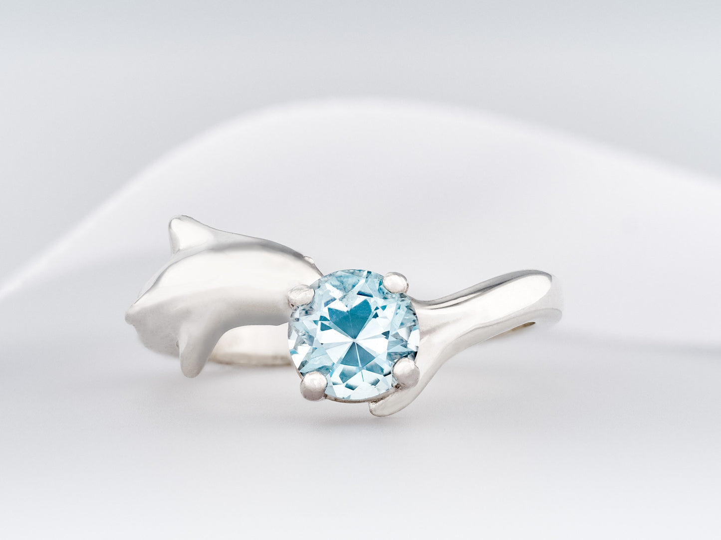 Blue topaz Dolphin ring. Natural, 6mm sky blue Topaz gemstone set in handmade premium silver ring.