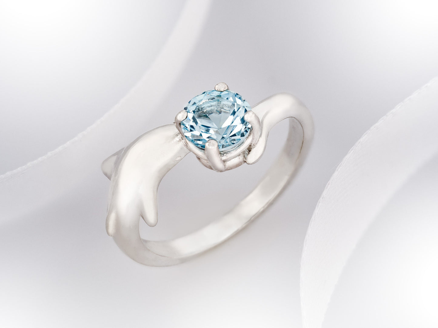 Blue topaz Dolphin ring. Natural, 6mm sky blue Topaz gemstone set in handmade premium silver ring.