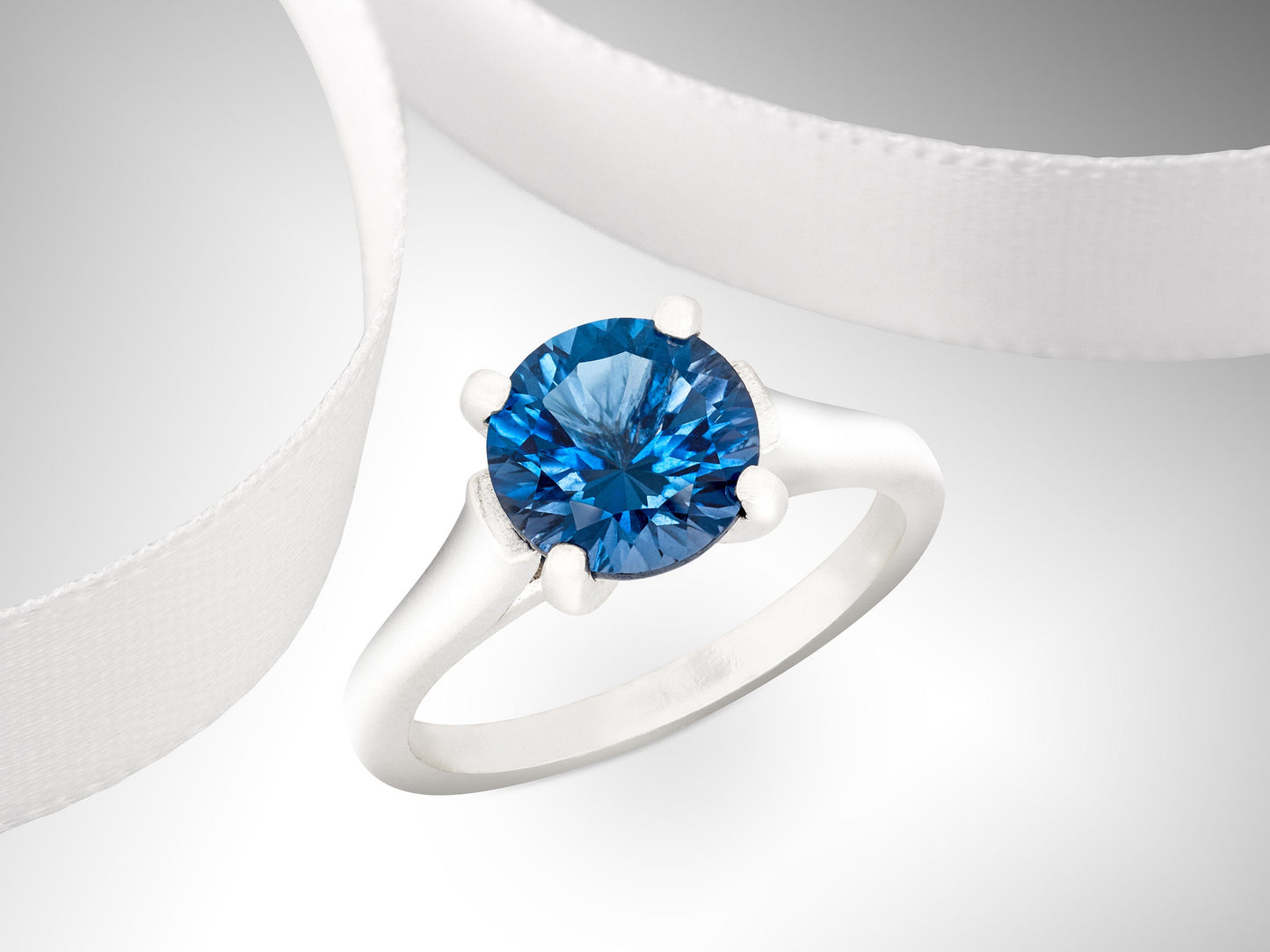 Deep Blue Topaz Ring. London Blue Color. Genuine, Brazilian London Blue Topaz Cathedral Ring. 8mm, 2.41ctw. Sterling Silver.