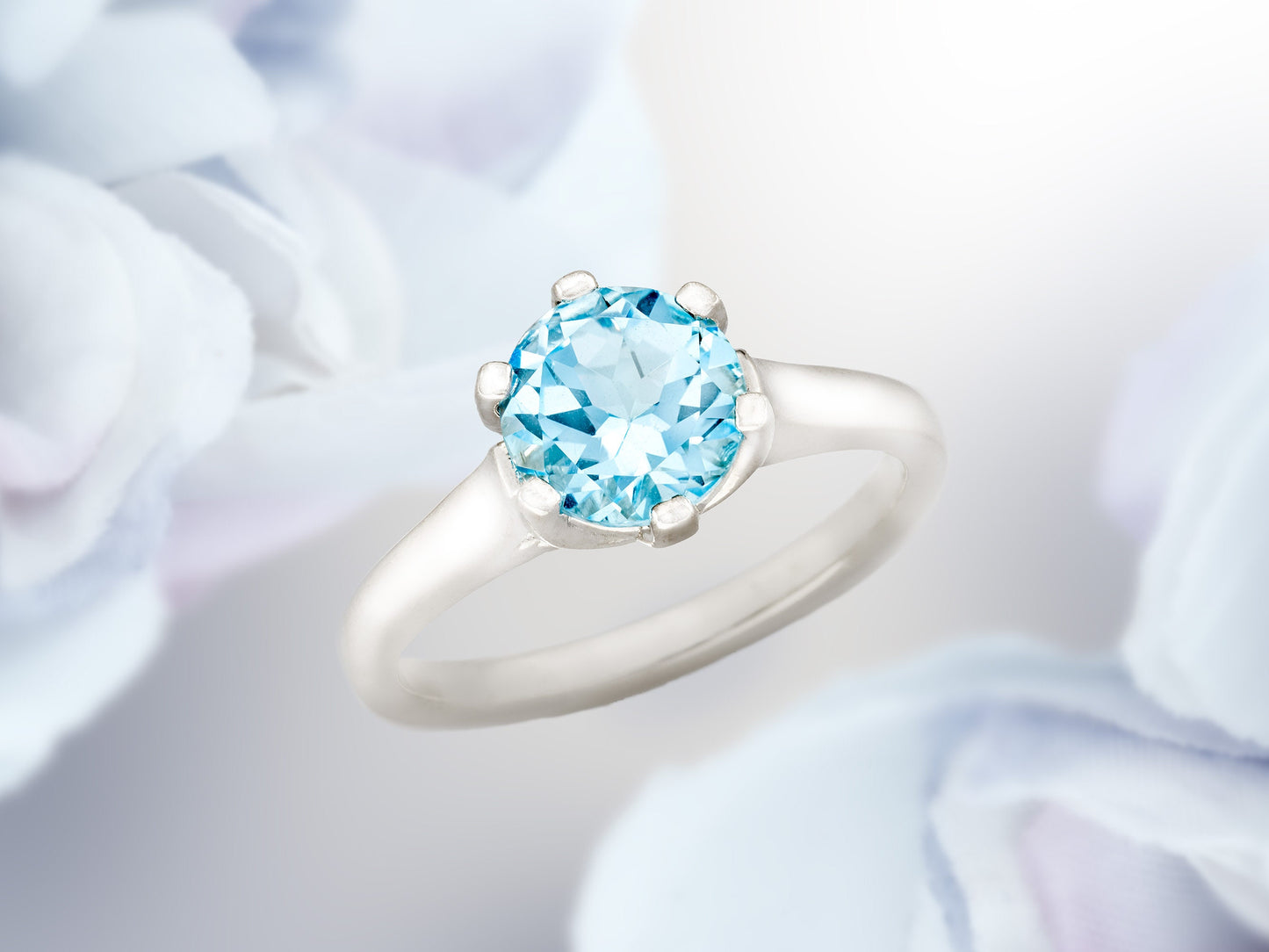 Classic 7mm round sky blue topaz ring. Authentic, Brazilian gemstone. Stylish weave crown cathedral design. Premium sterling silver material