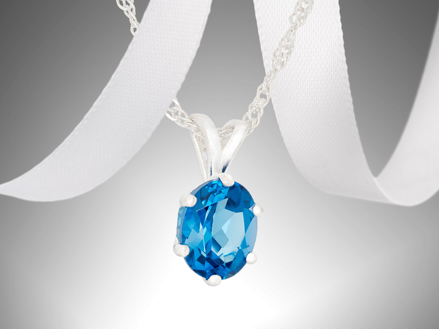 Gorgeous London Blue Topaz necklace. 9x7mm Oval, faceted, natural Brazilian Topaz. Sterling Silver.