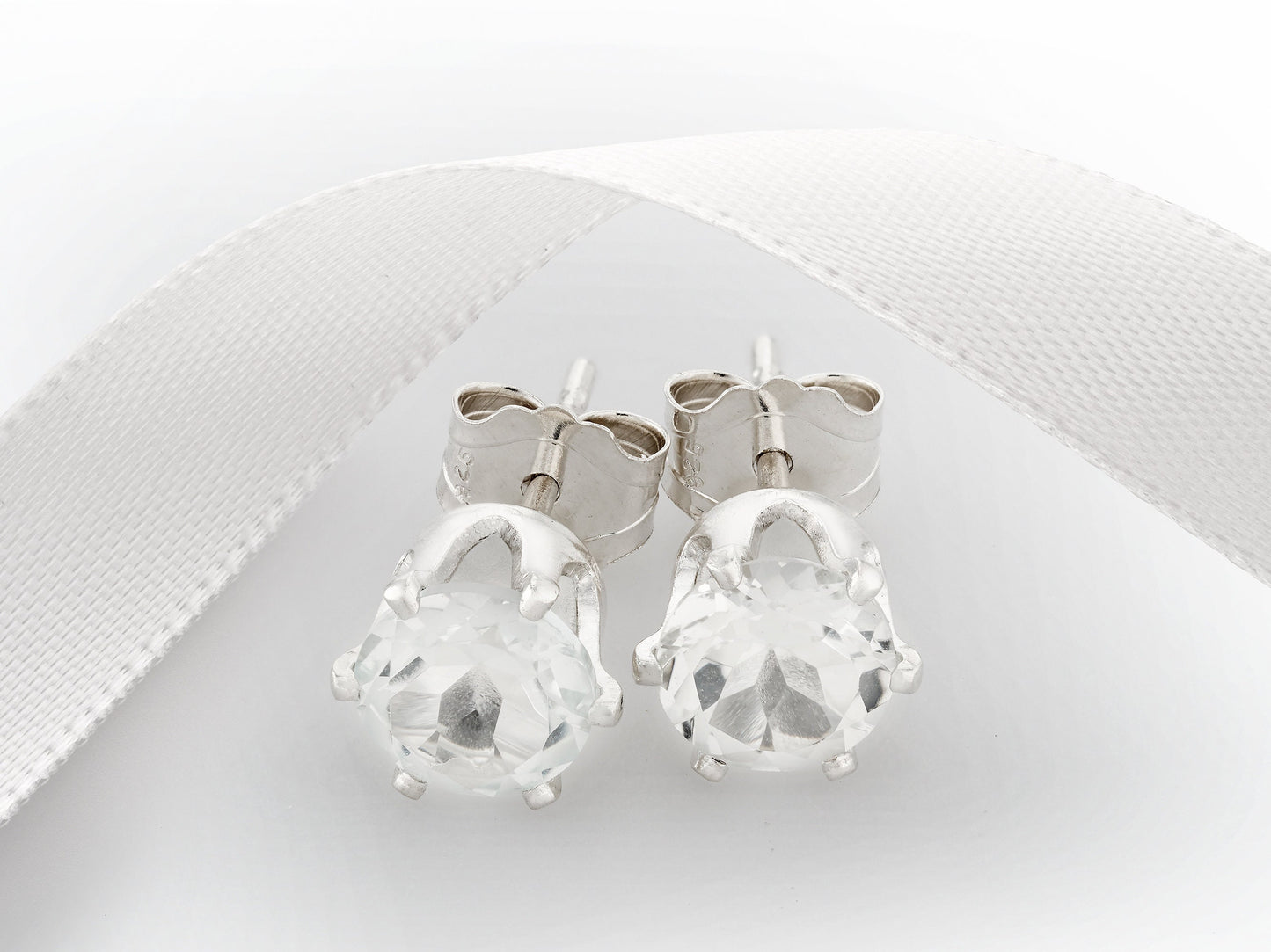 Striking, Natural, White Brazilian Topaz, Diamond Cut, 5mm Earrings.  6-Prong silver setting.