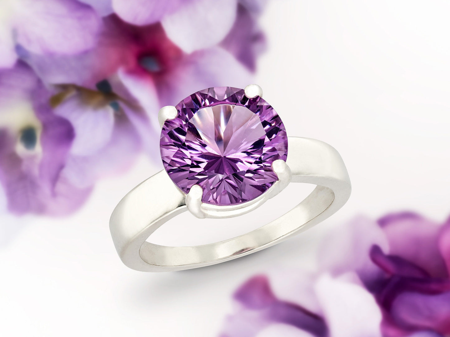 Special Edition Brazilian Amethyst ring.  Grade AAA, natural concave cut round gemstone set in premium silver. IF Clarity, 3.4ctw.