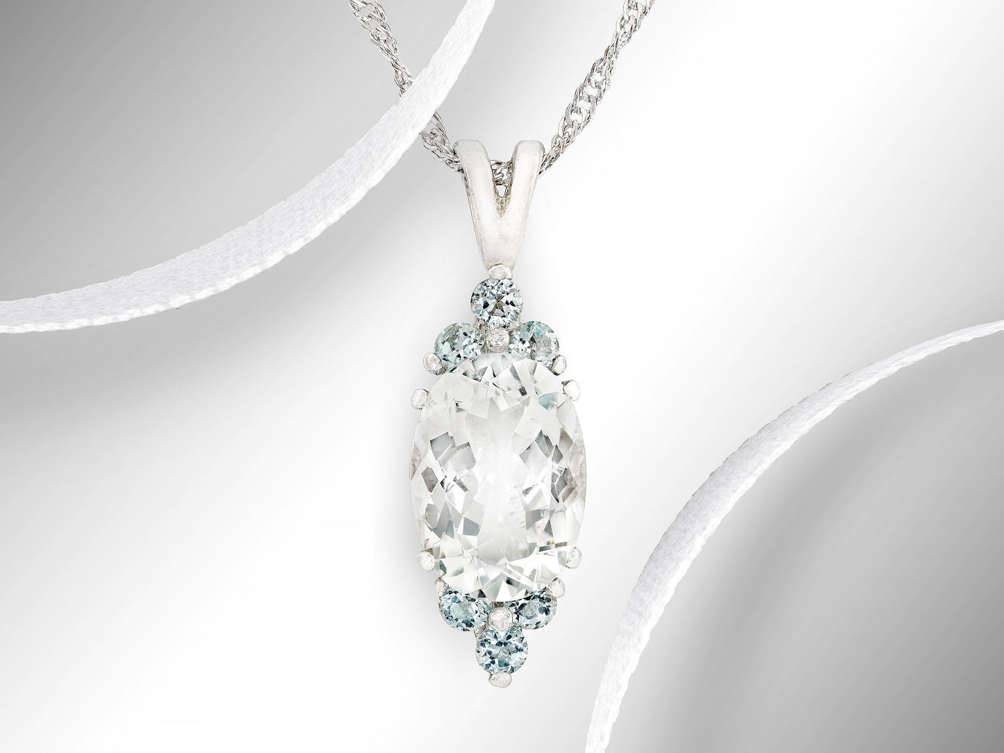 Unique, handmade, natural white topaz and aquamarine gemstone pendant necklace. 14x10mm oval, faceted, Brazilian topaz, light blue accents.