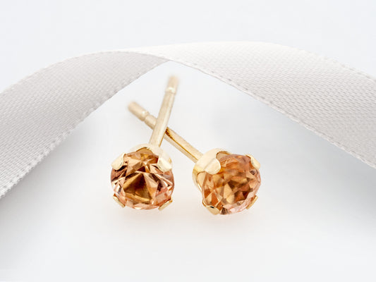 Rare, 3mm Diamond Cut Imperial Topaz Earrings in 14kt Yellow Gold. Yellow Orange. Ouro Preto, Brazil. 4-Prong Studs.