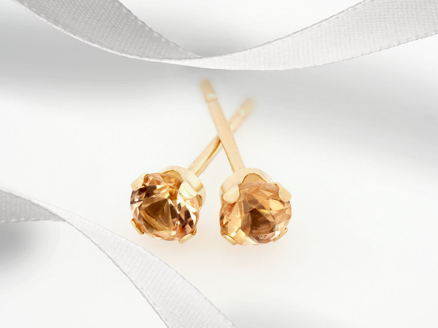 Rare, 3mm Diamond Cut Imperial Topaz Earrings in 14kt Yellow Gold. Yellow Orange. Ouro Preto, Brazil. 4-Prong Studs.