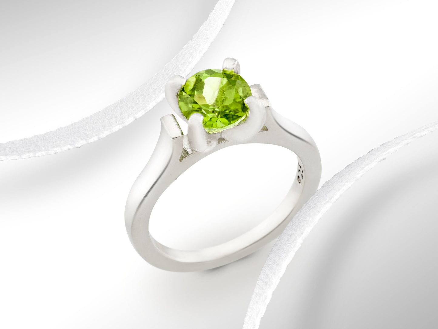 Striking Cathedral Ring featuring a brilliant 7mm round Peridot.  Sparkling August gemstone solitaire ring.