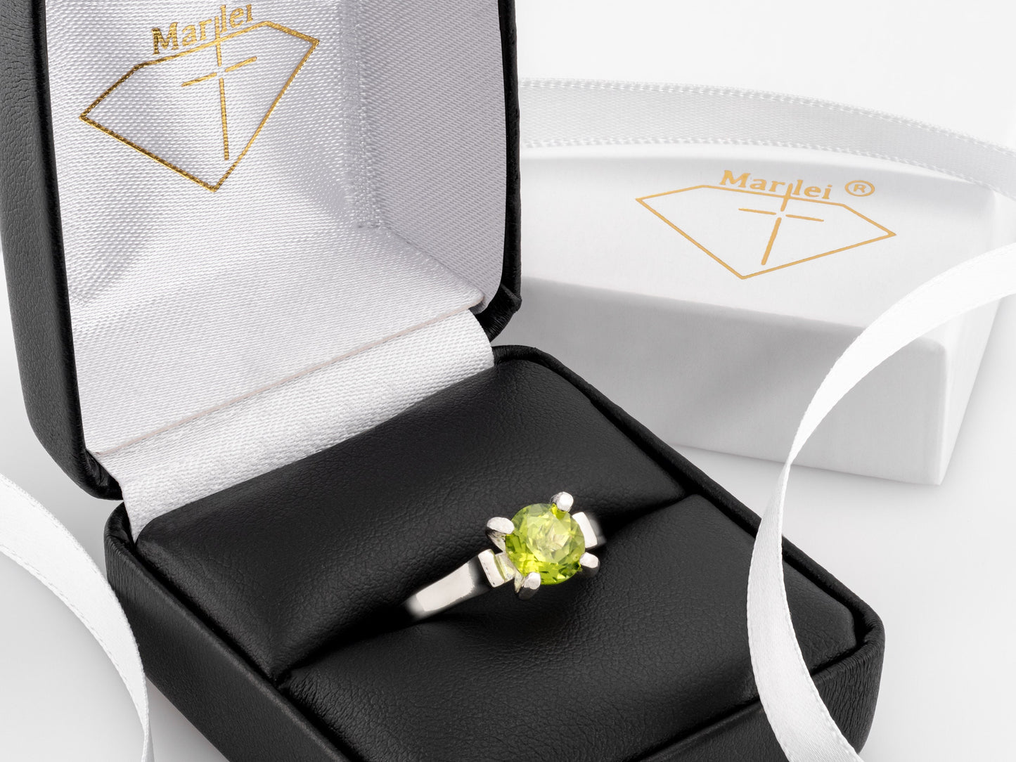 Striking Cathedral Ring featuring a brilliant 7mm round Peridot.  Sparkling August gemstone solitaire ring.