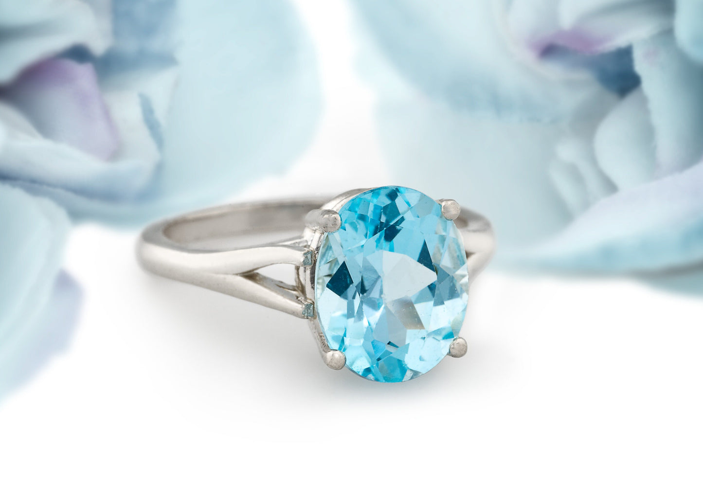 Fine Grade Sky Blue Topaz Ring in silver. Beautiful Color! Wonderful cut and clarity. Genuine Brazilian Gemstone! 11x9mm Oval, 4+ ctw.