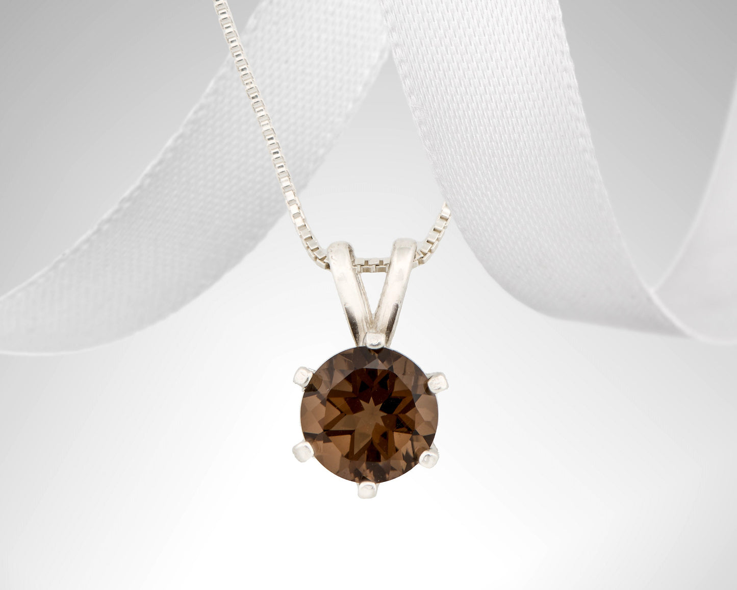 Classic brown smoky quartz necklace from Brazil! 7mm round, natural Brazilian gemstone in a 6-Prong, Sterling Silver Pendant.