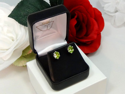 Vivid Green Peridot Earrings. Striking! 8mm x 6mm Oval Shape. Sterling Silver. Backs, case, and gift box provided.