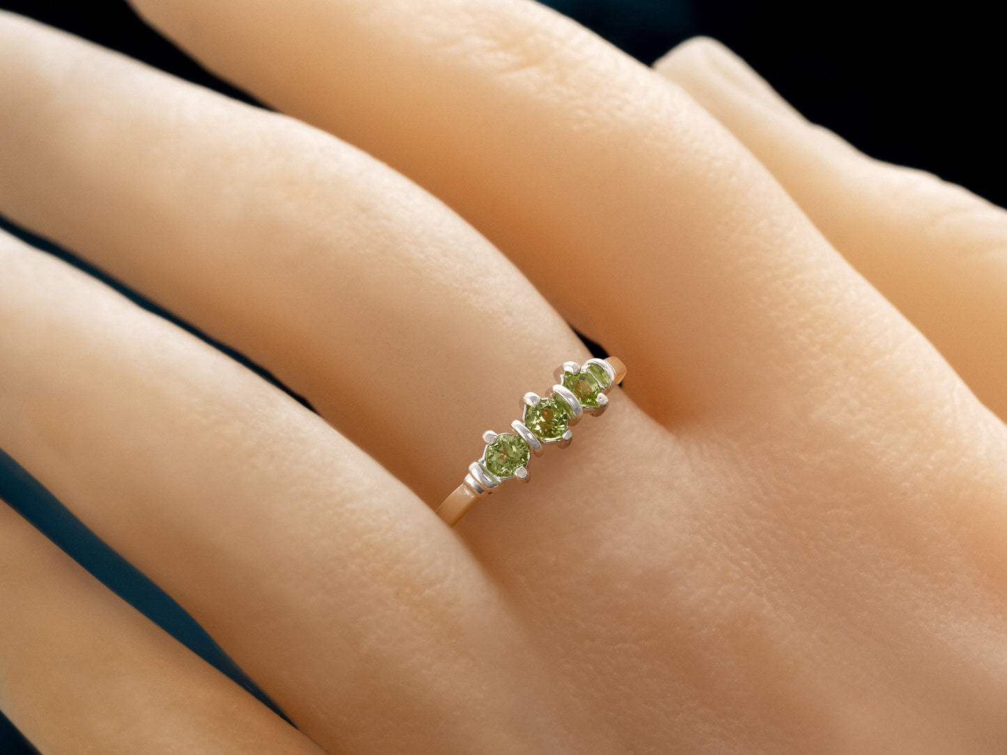 Three-Gemstone Band.  Lively green, natural, peridot!  Three Round Natural Peridot Gemstones set in Sterling Silver.