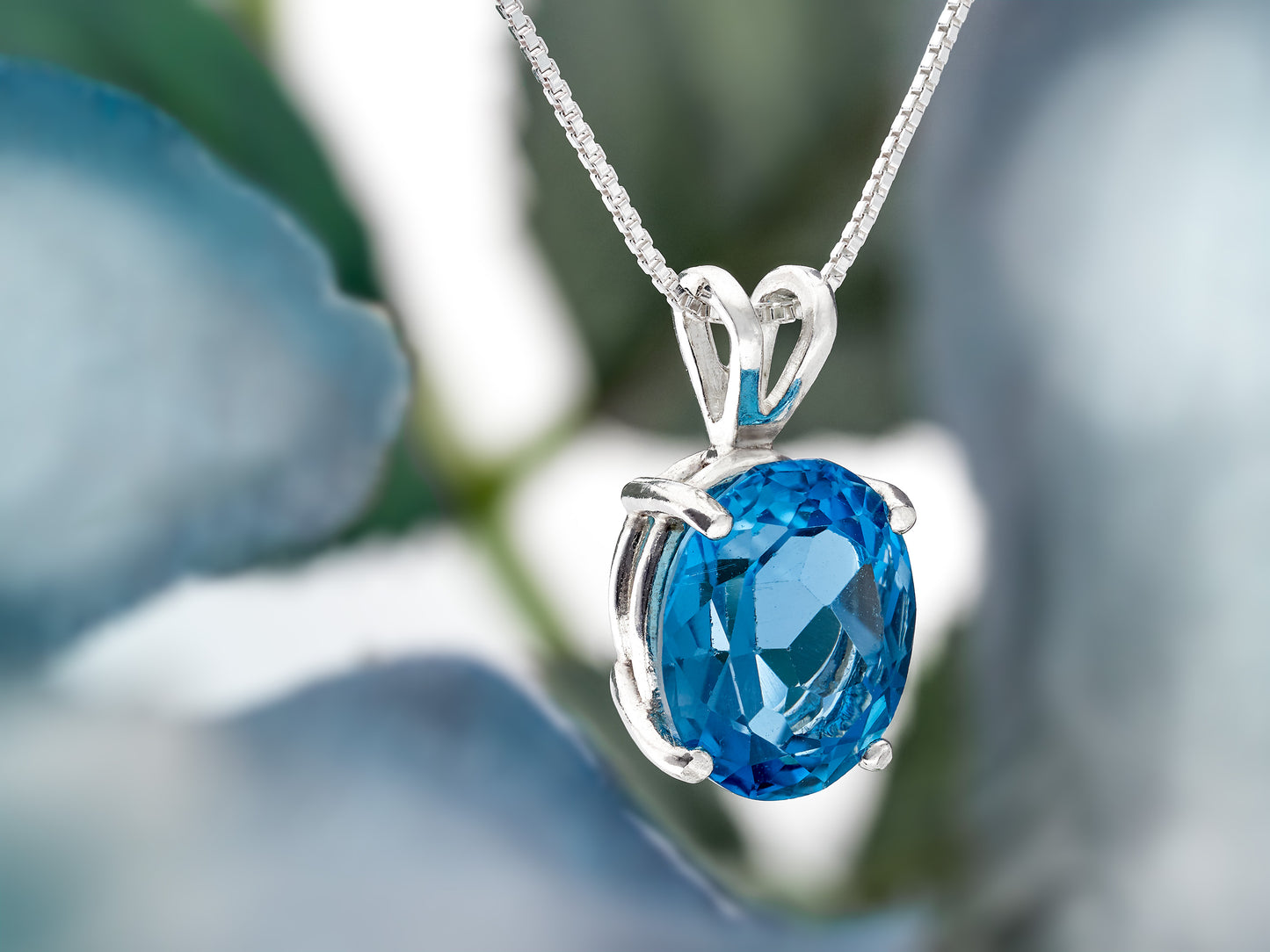 Classic Rich London Blue Topaz necklace. 11x9mm Oval, faceted, natural Brazilian Topaz. Sterling Silver.