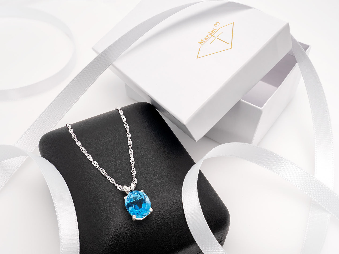 Classic Rich London Blue Topaz necklace. 11x9mm Oval, faceted, natural Brazilian Topaz. Sterling Silver.